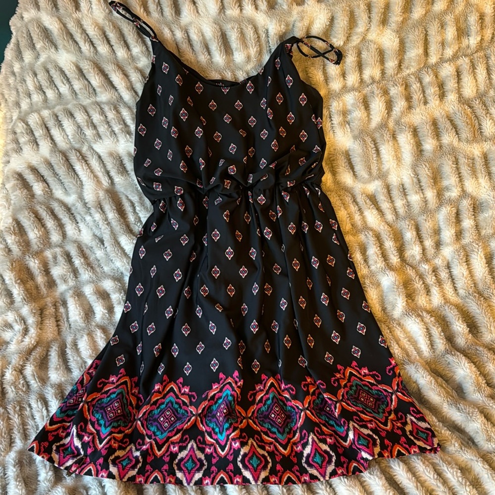Maurice’s short dress size xl. Black with pink, white, purple, teal. Stretchy.